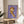 Contemporary pop art poster featuring a sad cat with ice cream cone in cream, yellow, and orange tones, capturing melancholic mood with retro pop sensibility and dark humor.