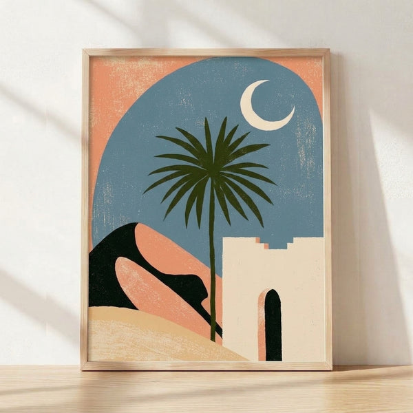 Minimalist desert landscape poster with a stylized palm tree silhouette against a coral orange sky and slate blue moon arch, framed on a wall.