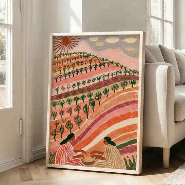 Retro-inspired nature wall art depicting a serene mountain landscape with terraced fields, desert plants, and a woman figure under a radiant sunrise in rust red, coral pink, and cream palette.