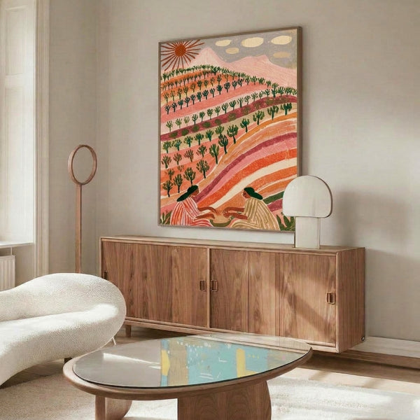 Japandi-style framed poster of peaceful hillside terrain with cactus and foliage, soft morning sun, and a solitary female silhouette in warm terracotta and green tones with bohemian charm.