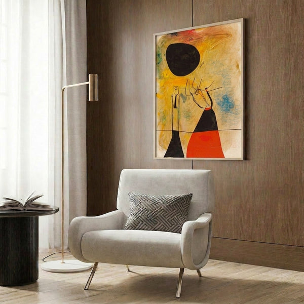 Framed abstract art featuring two whimsical figures with organic, flowing shapes in vibrant primary colors and black accents.