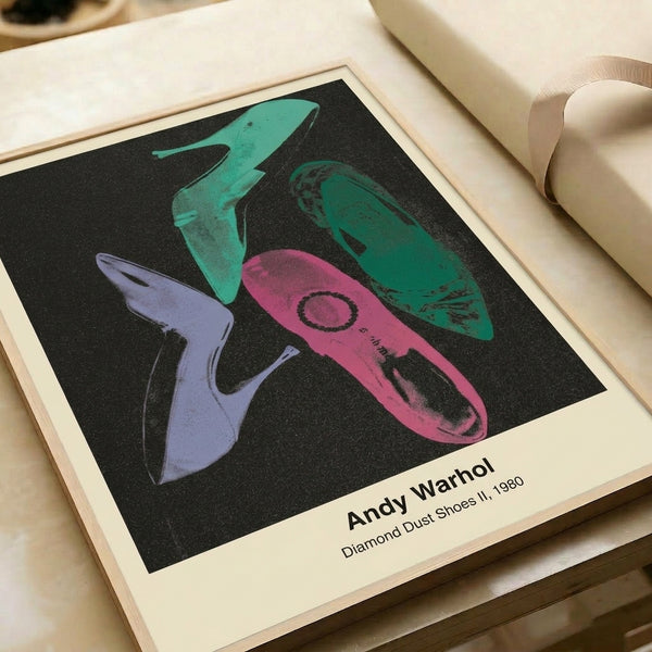 Modern minimalist pop art print showing black shoes with metallic diamond dust highlights, glamorous monochromatic framed wall artwork in contemporary style.