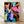 Pop art poster of diamond dust shoes in vibrant jewel tones with shimmering metallic accents, framed on a wall.