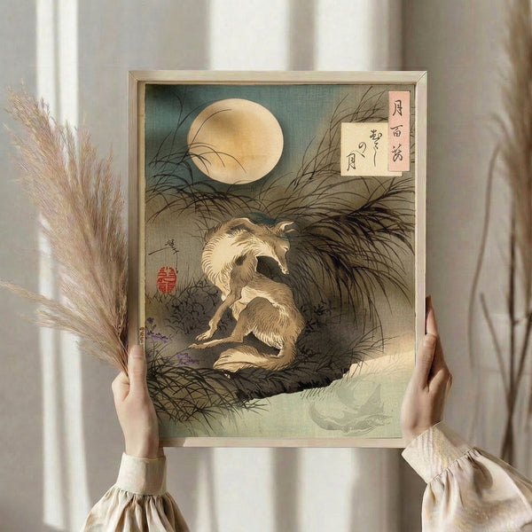 Japanese woodblock poster art showing a dog in contemplative pose beneath the moon, rendered in earthy cream, teal-grey, and gold accents.
