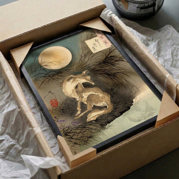 Framed Japanese woodblock poster art of a dog beneath the moon in grass, rendered in traditional style with cream, teal-grey, and dark brown.
