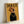 Framed pop art poster showcasing a fashionable golden retriever in gold and black hues, complete with statement chain jewelry and contemporary irreverent flair.