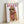 Trendy dogue doodle art print featuring a dog in designer sunglasses and burgundy scarf against a cream background with gold accents.
