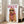 Chic dogue illustration wearing oversized shades and a scarf, modern pop art style poster in warm cream and burgundy tones.