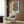 Iconic pop art wall print featuring a dollar bill rendered in high-contrast colors including black, white, and green with geometric, commercial sensibilities.