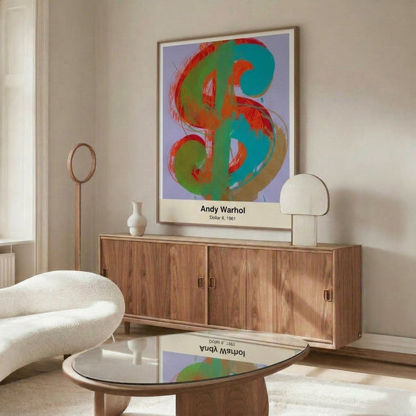 Framed pop art poster of a stylized dollar image in striking black, white, and silver hues, embodying the bold, mass-culture aesthetic of 1960s modern art.