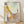 Abstract surreal painting with playful organic forms in warm earth tones and vibrant accents, framed as modern wall art.
