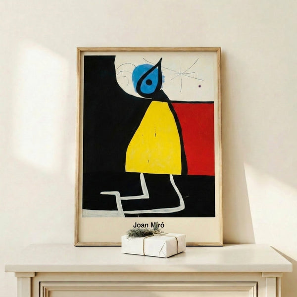 Wall-hung framed print of abstract figure in night setting; mysterious composition using black, cream, and warm red-ochre palette in surreal style.