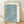 Japanese woodblock print featuring dotterel birds in a flowing stream surrounded by rocks, rendered in pale blue, teal, and cream tones with serene, contemplative mood.