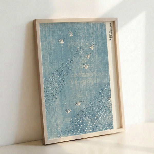 Framed poster of dotterel birds in a stream with rocks, Japanese woodblock art style in muted teals and creams, conveying peaceful natural beauty.