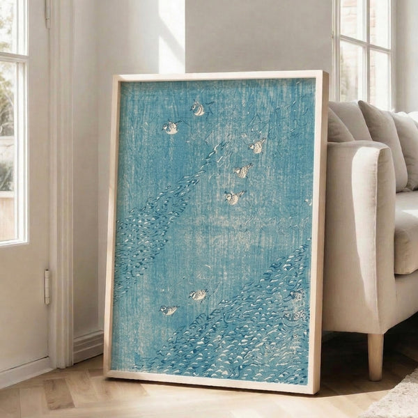 Asian woodblock print featuring dotterel birds in flowing water with contemplative mood, rendered in cream, teal, and soft blue hues on framed poster.