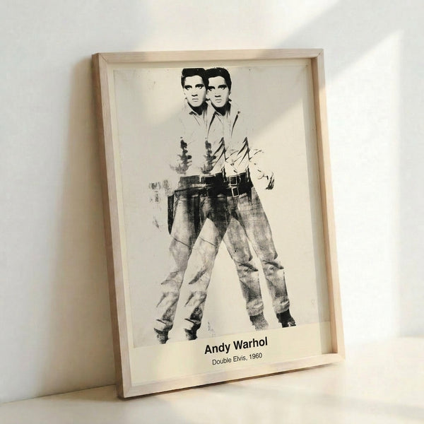Framed pop art poster with two identical cinematic silhouettes in silver and black against a minimalist background.