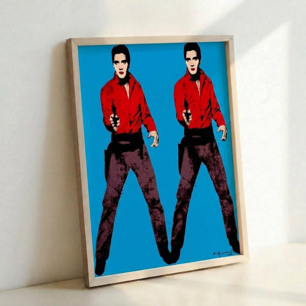 Double Elvis pop art poster with faceless profile silhouettes in striking color contrasts, displayed as a framed modern art print.