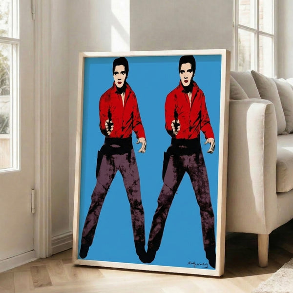 Andy Warhol-inspired pop art featuring two mirrored Elvis portraits in bold saturated colors, a contemporary poster design for statement wall decor.