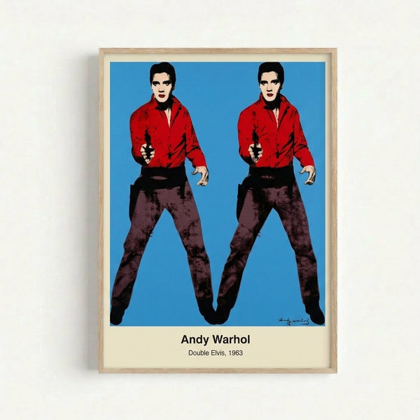 Double Elvis framed art print with duplicated cowboy-hatted figure rendered in vibrant pop art colors of black, red, and yellow against a modern minimalist wall.