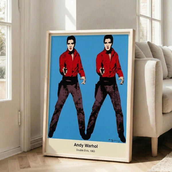 Faceless pop art figure doubled in composition using black, silver, and red hues, capturing the iconic Warhol aesthetic of 1960s celebrity culture as a framed poster.