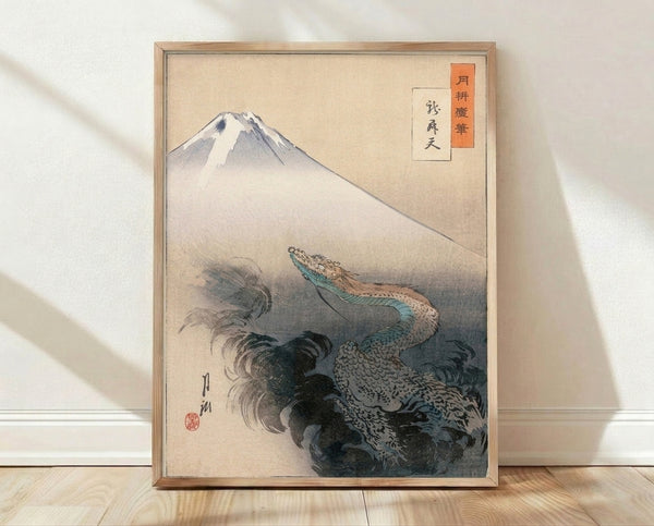 Traditional Japanese woodblock print featuring a mythical dragon coiling through clouds above Mount Fuji, rendered in serene blue-grey and cream tones with rust orange accents.