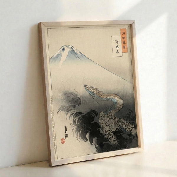 Contemplative Japanese artwork depicting Mount Fuji with an intertwined dragon figure, executed in traditional woodblock technique with a palette of cream, gray, and muted rust tones.