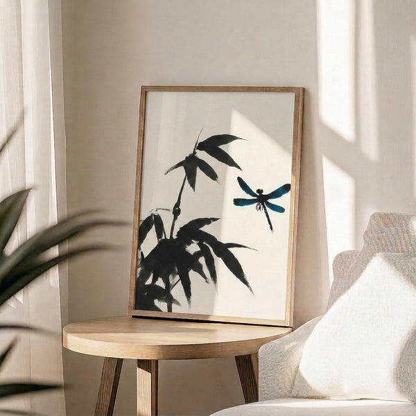 Zen-inspired wall art depicting a dragonfly and bamboo plant in restrained Japanese line drawing style with cream, black, and muted teal palette.