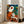 Abstract framed print combining cubist geometry with surrealist imagination, featuring interlocking figures in terracotta, mustard, and deep accent hues.