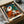 Abstract surreal poster with intellectually playful household and figure imagery in earth tones and cream, exemplifying modern artistic dreamlike interpretation.