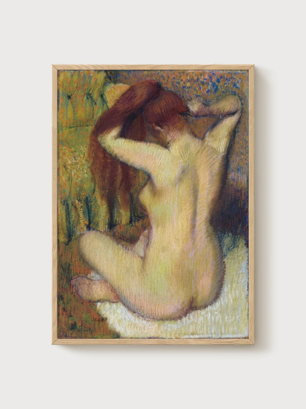 Edgar Degas Woman Combing Her Hair Poster poster in oak frame
