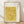 Japanese woodblock print featuring delicate ivy leaves and branches winding through a geometric lattice trellis in soft mustard and cream tones, evoking serene minimalist aesthetics.