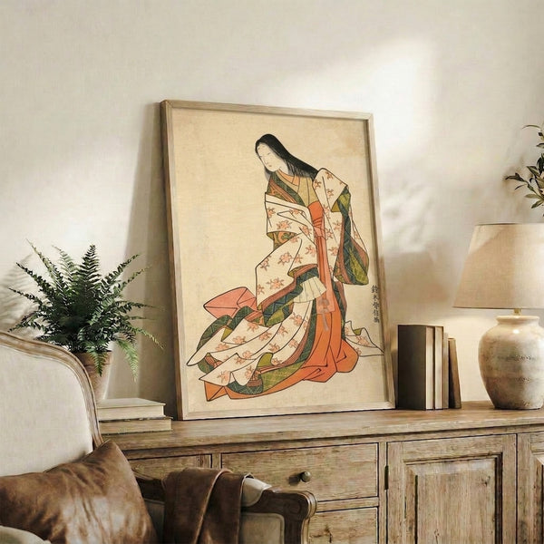 Serene Japanese art print portraying a geisha amid decorative floral arrangements, her kimono rendered in refined coral and olive hues with ornamental detail work throughout.