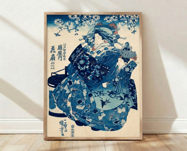 Classical Japanese woodblock print of an elegant geisha in a richly patterned indigo kimono holding a decorative fan, surrounded by birds and flowering branches in cream and navy tones.