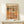 Vintage geometric border pattern poster with ancient Egyptian ornament details in cream, gold, green, and red tones, Art Deco style.