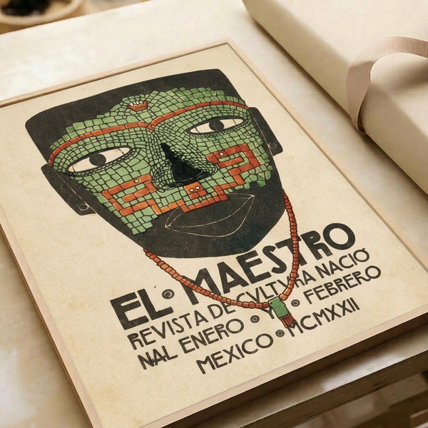 El Maestro framed print with striking Art Deco mask design featuring intricate mosaic beadwork and jewelry motifs in charcoal, cream, sage green, and rust orange.