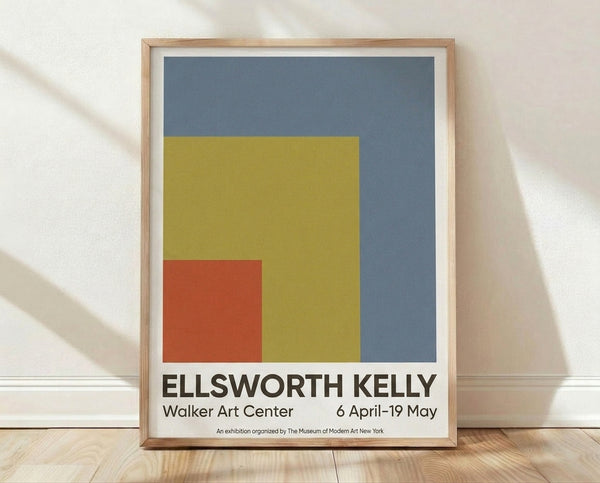 Framed minimalist poster print featuring bold geometric rectangles in slate blue, golden yellow, rust red, and cream, inspired by Bauhaus color field principles.