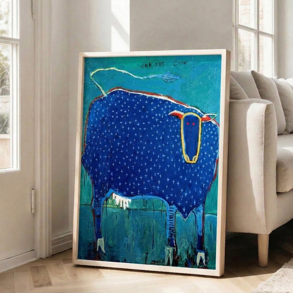 Boho wall art featuring a delightfully quirky cow character flying a kite, executed in simple line art with wabi sabi charm and a warm color palette of blues, reds, and yellows.