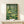 Framed minimalist forest print showcasing layered mushrooms and trees in cream, forest green, and pale yellow hues.