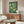 Contemporary Bauhaus-style poster of a magical mushroom woodland in soft cream, forest green, and sage tones.