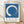 Minimalist enso circle in deep blue brushstroke on cream background, a serene zen-inspired poster embodying wabi-sabi aesthetics and meditative calm.