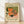 Vintage mid-century still life poster featuring a moka pot espresso maker, steaming coffee cup, fresh orange slices, and botanical leaves in warm burnt orange, olive green, cream, and blush pink tones.