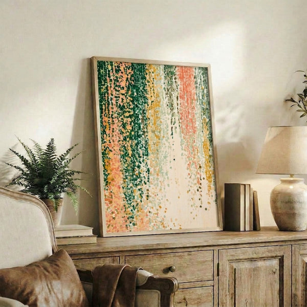 Framed modern art print with sage green and warm coral dots arranged in a graceful descending pattern against neutral backdrop, creating a contemplative zen aesthetic.