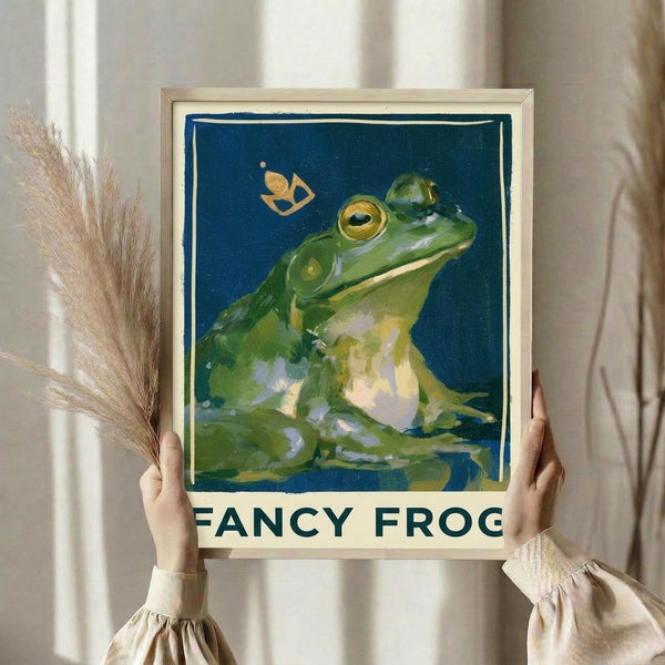 Whimsical Art Deco frog art print on wall in deep teal and olive green with gilded gold details, evoking vintage elegance and charm.