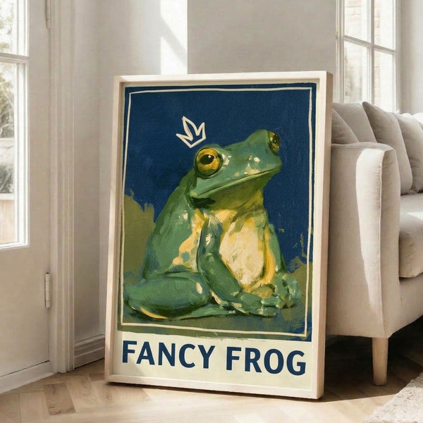 Nostalgic Art Nouveau poster of a crowned frog in dignified pose, featuring deep navy blue, soft sage green, and warm cream tones with gold accents throughout the ornate design.