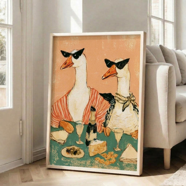Vintage poster print of a playful goose in sunglasses enjoying wine and appetizers, rendered in a sophisticated retro aesthetic with cream, coral-orange, and black accents.
