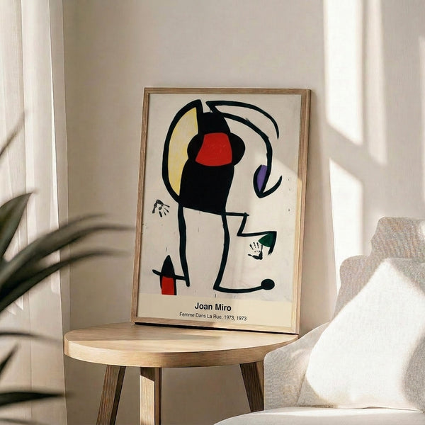 Surrealist wall art print with abstracted figure rendered through colorful interlocking shapes in red, blue, yellow, and black, displaying playful modernist composition.