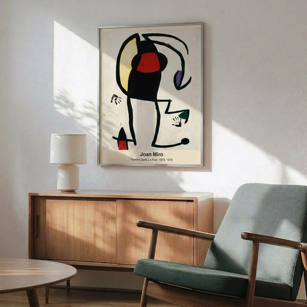 Abstract surrealist poster showing a stylized woman through flowing geometric forms and bold primary colors against white, capturing whimsical modernist movement aesthetics.