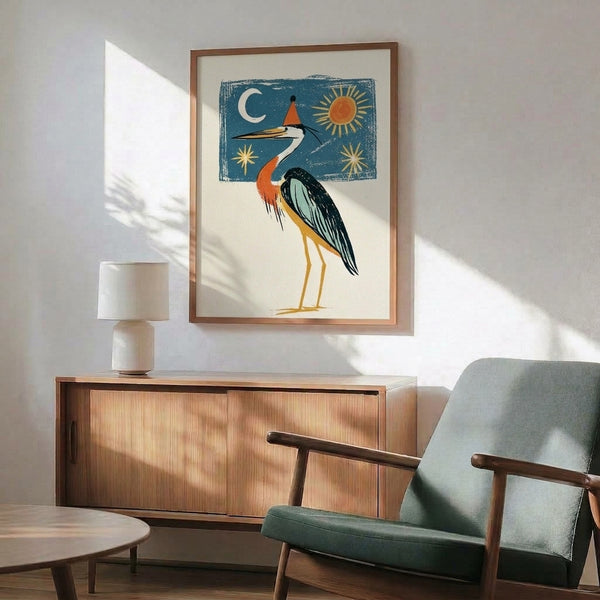 Celebratory folk art poster of a teal heron crowned with a party hat, set against a whimsical night sky with golden celestial details and cream accents.