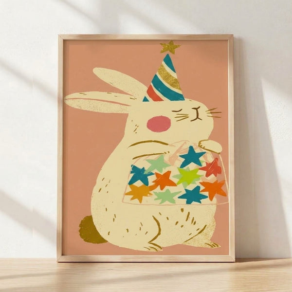 Cheerful retro-style bunny wearing a party hat, holding a jar of stars, rendered in soft cream, coral, teal, and gold tones on a framed poster.