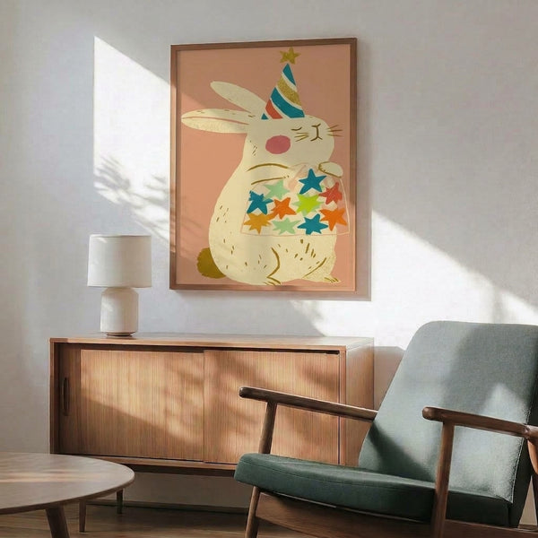 Boho-inspired poster of a playful rabbit in celebratory party attire surrounded by stars and soft colors including cream, teal, and gold highlights.